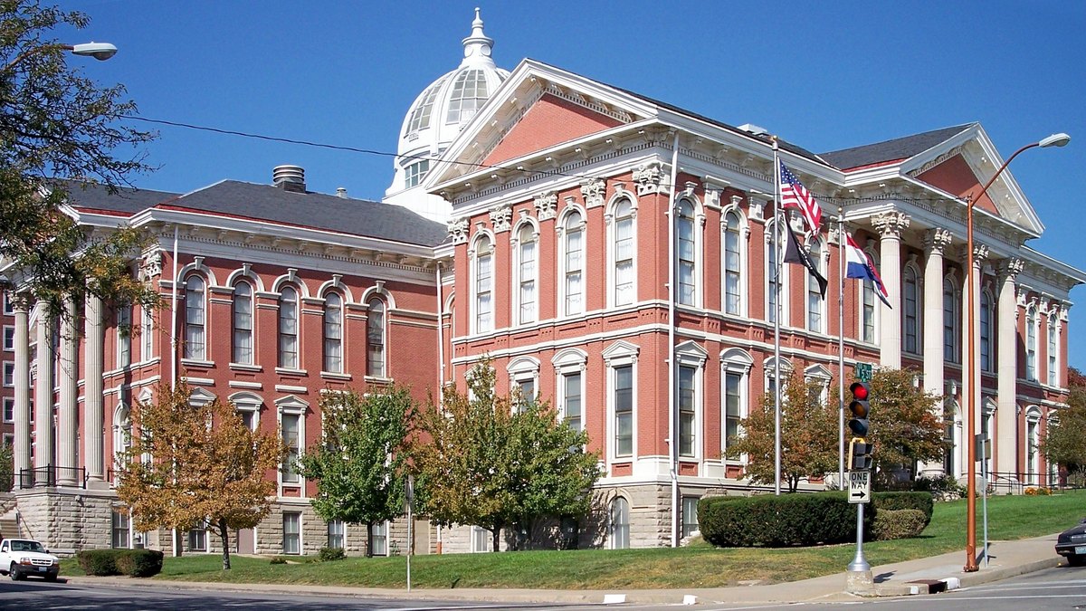 The red-brick Buchanan County Courthouse with a white dome in downtown St. Joseph, Missouri