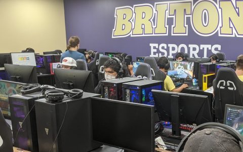 Students playing at gaming PCs in a college esports lab