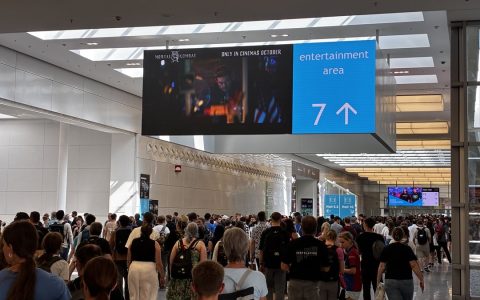 Visitors walking through a hall at Gamescom in Cologne