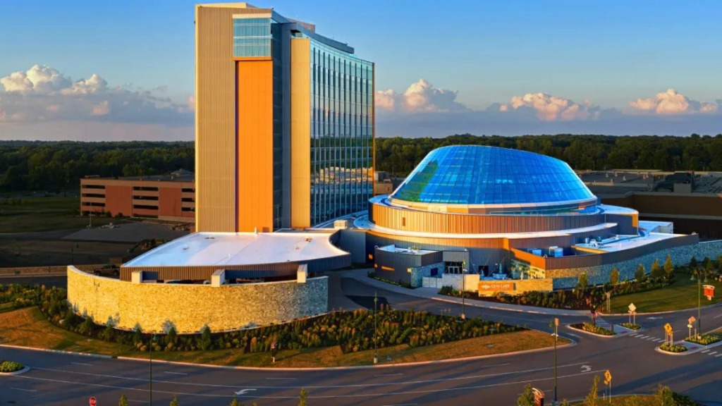 Exterior view of Gun Lake Casino Resort featuring the hotel tower and glass dome in Michigan