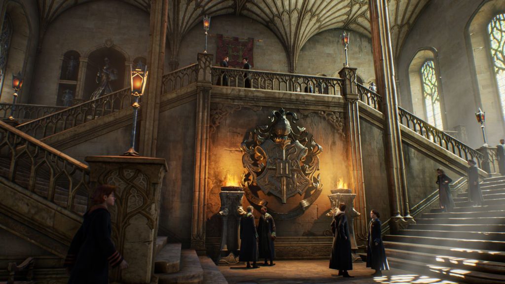 Official Hogwarts Legacy screenshot of a student casting a spell in a castle hall