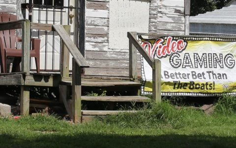 A "Video Gaming" banner outside a small business in Illinois