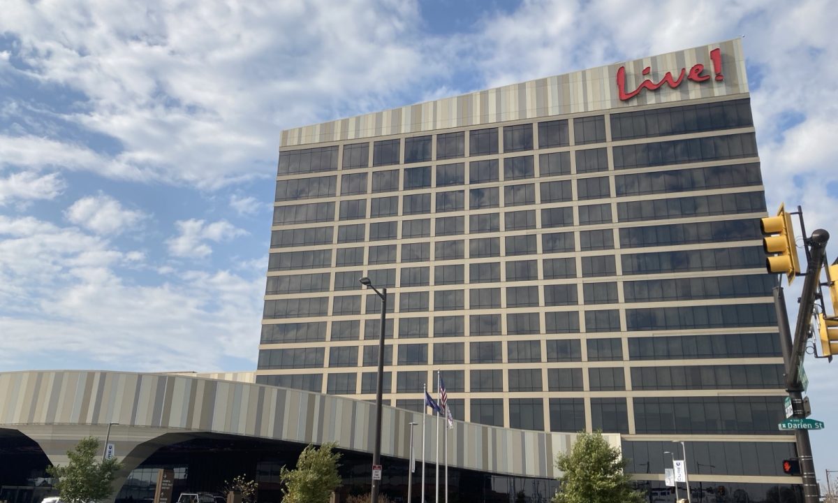 The Live! Casino & Hotel Philadelphia, a tall hotel tower with a red Live! sign beside a curved casino building