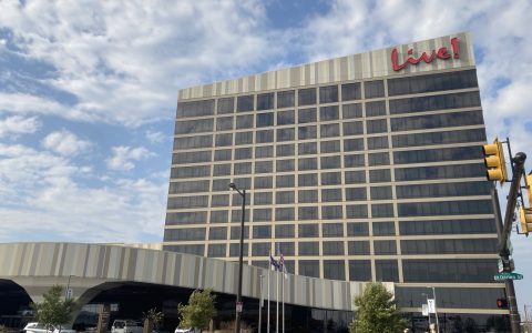 The Live! Casino & Hotel Philadelphia, a tall hotel tower with a red Live! sign beside a curved casino building