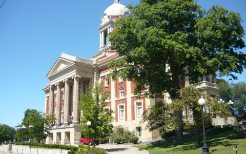 The Mercer County Courthouse in Mercer, Pennsylvania, a red brick building with white columns and a dome