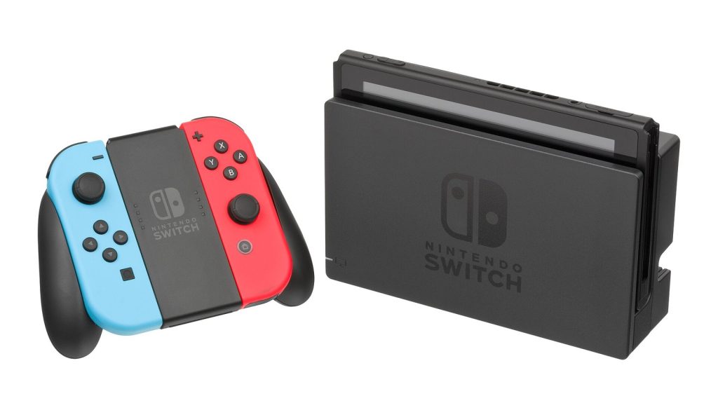 A Nintendo Switch console in its dock with a Joy-Con grip