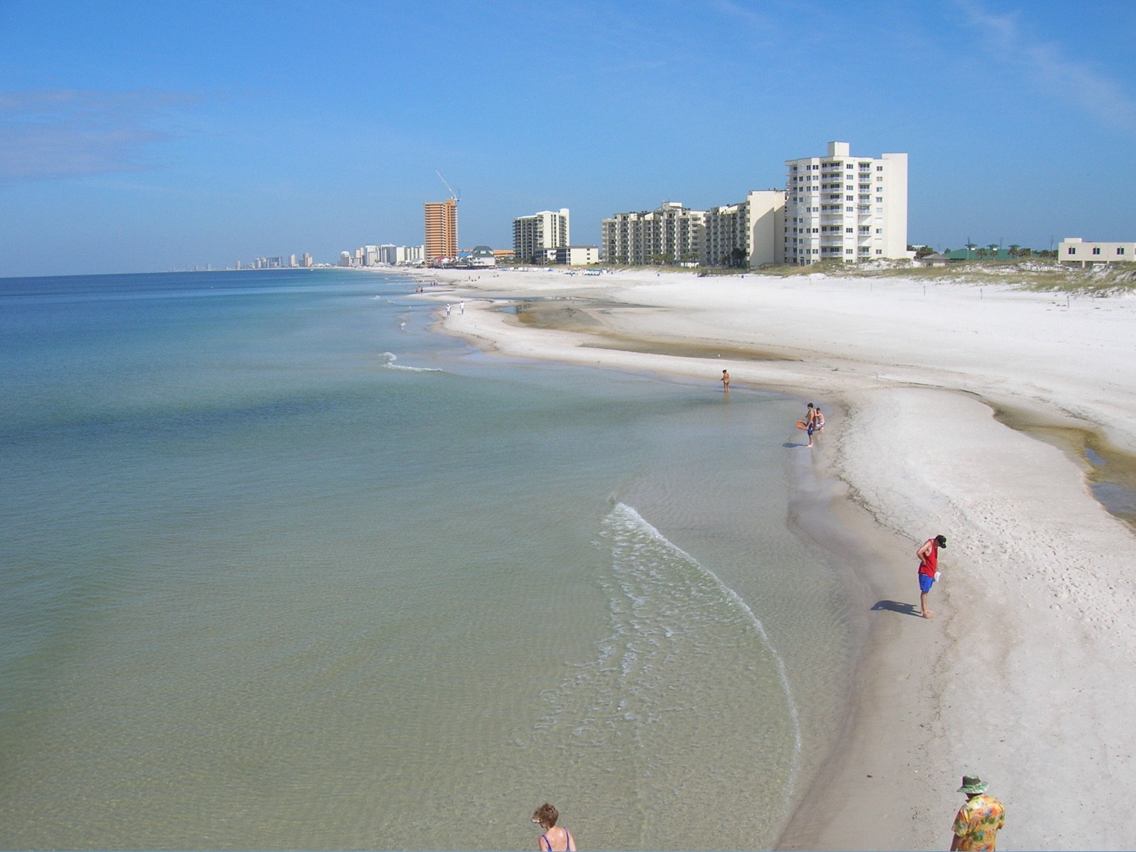 The beach and shoreline hotels of Panama City Beach, Florida, seen from St. Andrews pier