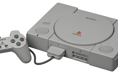 An original Sony PlayStation console with its controller