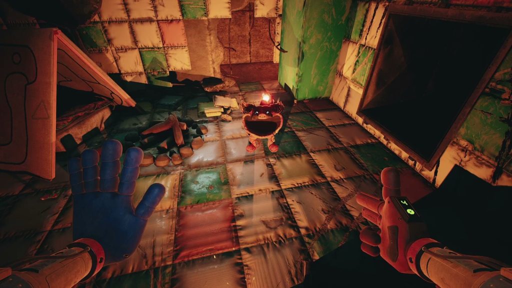 A small smiling toy creature holding a flame in a tilted, padded room lit orange, with the GrabPack hands in view
