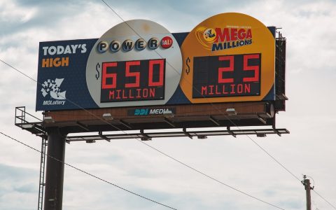 A Powerball and Mega Millions jackpot billboard beside a highway in Missouri