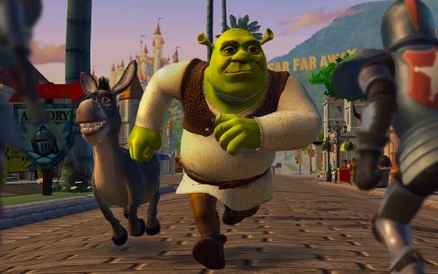 Shrek and Donkey run down a street in Far Far Away toward an armored knight in Shrek 2 Remastered