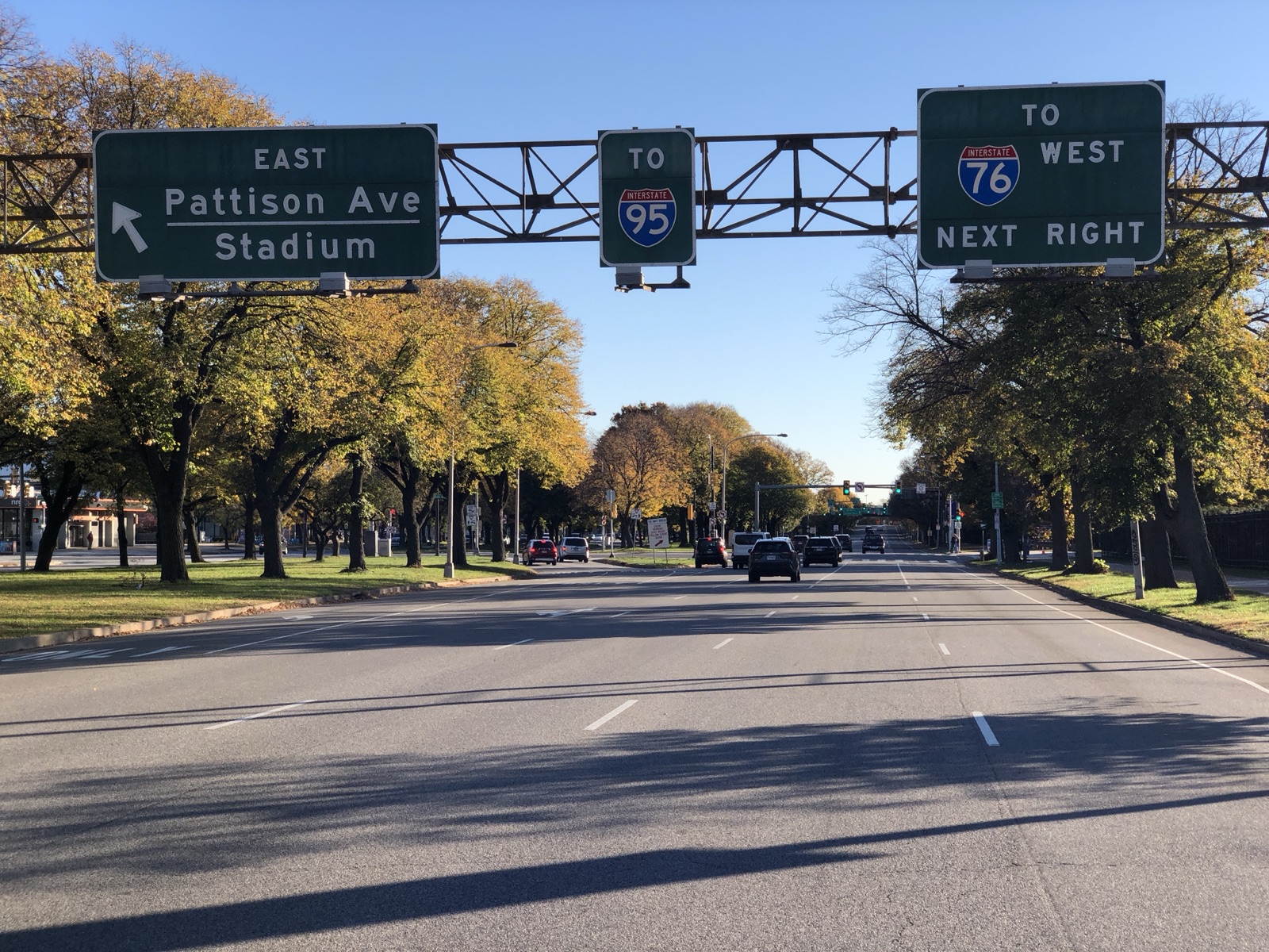 South Broad Street in South Philadelphia with overhead highway signs for Pattison Avenue and the stadiums